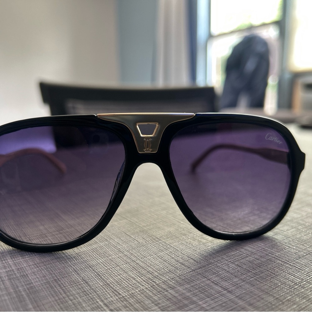 Cartier Black Frame Sunglasses with Purple Gradient Lenses and Gold Accent